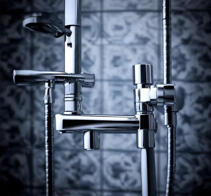 Chrome rainfall shower on tiling